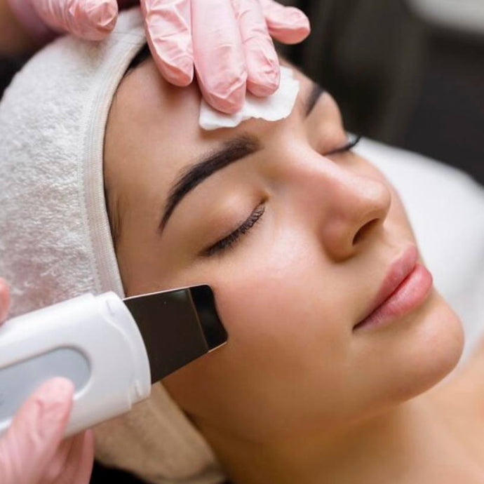 the girl is having a signature ultrasound facial